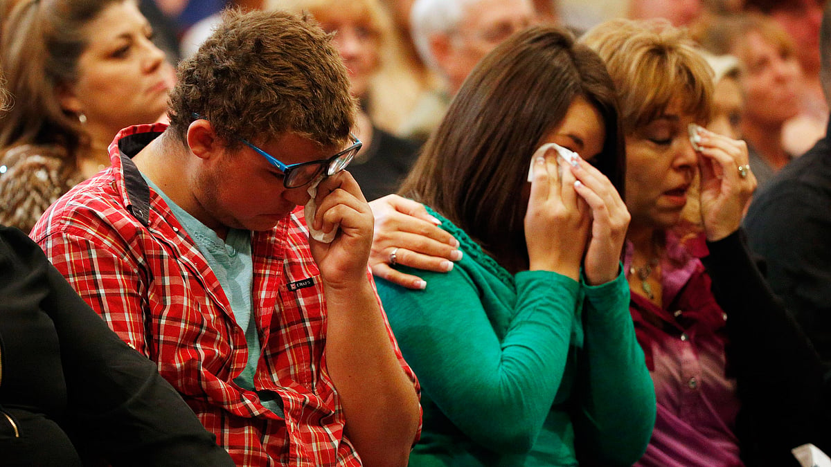 Survivors of the shooting at the Roseburg (Oregon) Community College at a church service on October 4, 2015. (Photo: AP)