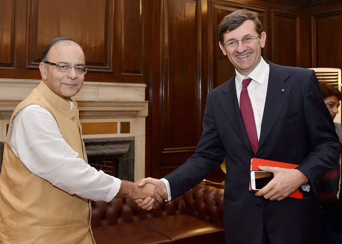Union Minister for Finance, Corporate Affairs and Information & Broadcasting, Arun Jaitley shakes hand with Vodafone Group CEO Vittorio Colao during a meeting in New Delhi. (Photo: PTI)