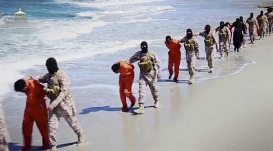 Islamic State militants lead what are said to be Ethiopian Christians along a beach in Wilayat Barqa, in this still image from an undated video made available on a social media website on April this year. (Photo: Reuters)