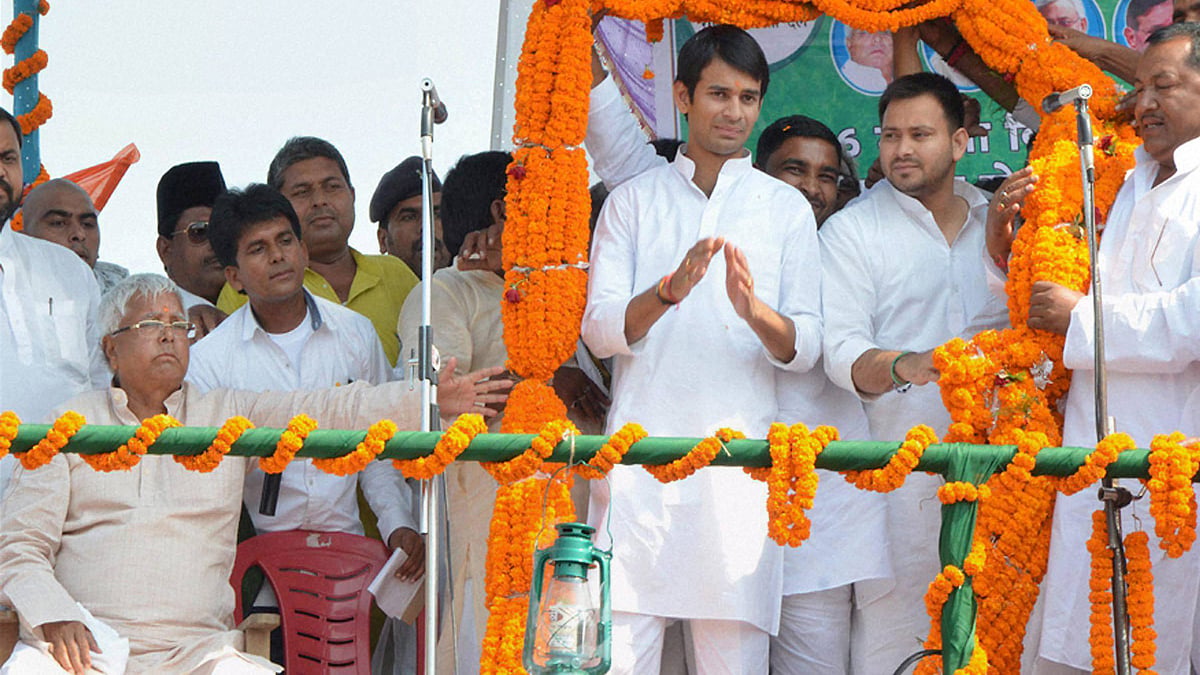 RJD chief Lalu Prasad with sons Tejaswi Yadav and Tej Pratap at a rally in Hajipur, Bihar, October 5, 2015. (Photo: PTI) 