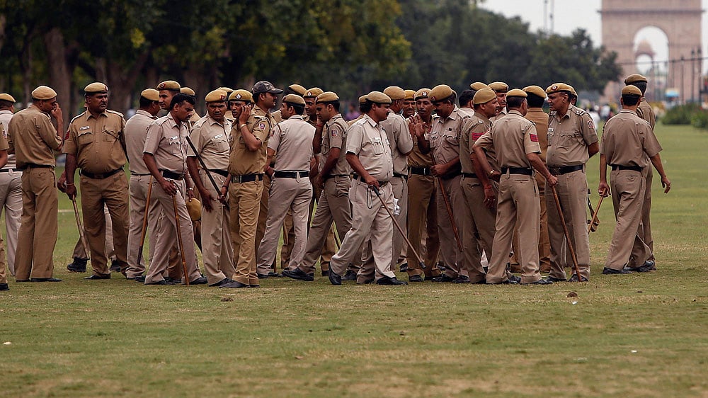 Police officers gather for a briefing near the India Gate in New Delhi, India, July 27, 2015. (Photo: Reuters)