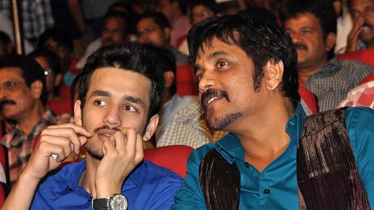 Akhil Akkineni with his father Nagarjuna (Photo: <a href="http://www.newsthere.com/entertainment/shiva-cycle-chain-fight-in-akhils-debut-movie/1849/">www.newsthere.com</a>)