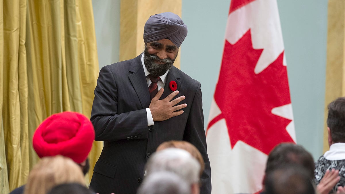 Canada’s Defense Minister Harjit Singh Sajjan reacts after being sworn in during a ceremony at Rideau Hall, Wednesday Nov. 4, 2015 in Ottawa. (Photo: AP)