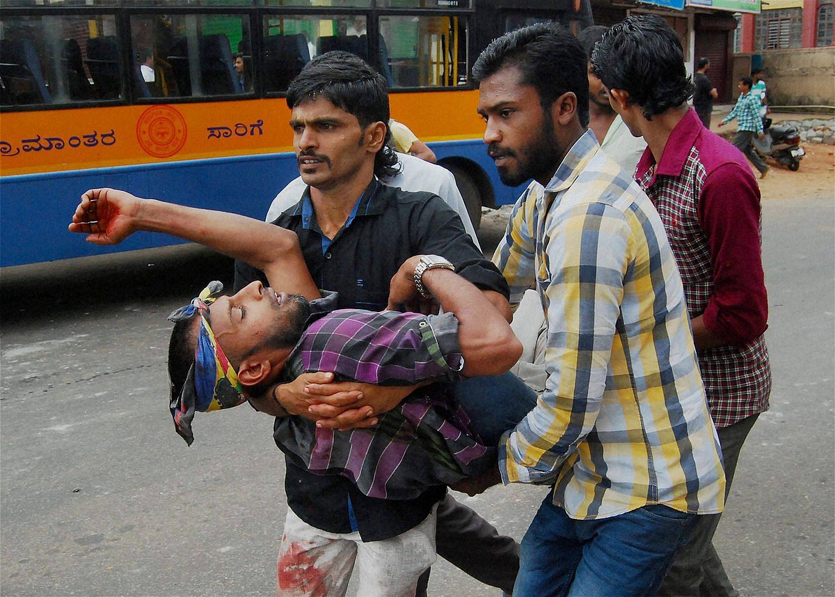 An injured being taken away for medical aid after two groups clashed over governments decision to go ahead with Tipu Sultan Jayanti celebrations, in Kodgu on Tuesday. (Photo: PTI)