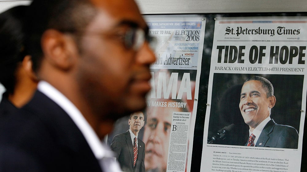 People look at newspaper front pages from around the world bearing the election victory of Barack Obama in Washington, November 5, 2008. (Photo: Reuters)