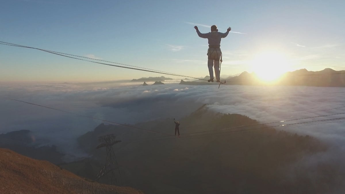 Highliners from around the globe come to the Swiss mountains to walk across the world’s longest highline. (Photo: AP screengrab)