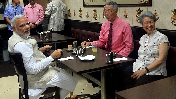Prime Minister Narendra Modi and his Singaporean counterpart PM Lee Hsien Loong go for tea to an Indian restaurant in Little India, Singapore.