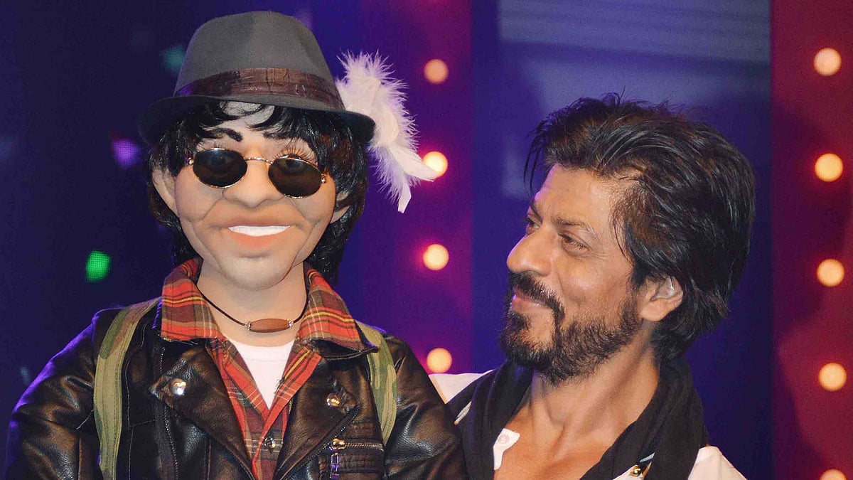 

Shah Rukh Khan at his 50th birthday party. (Photo: Yogen Shah)