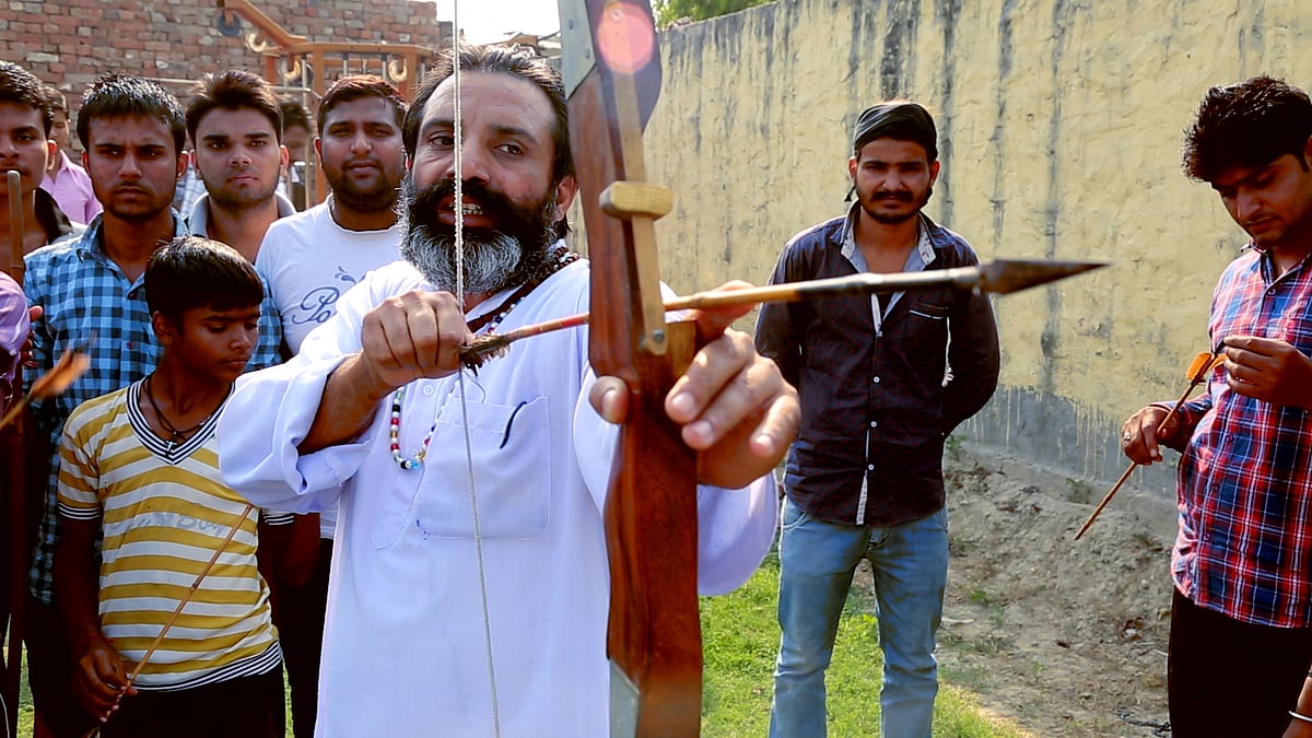 Parminder Arya, who has served for 15 years in the Indian Army, is giving military training to young Hindus in Rori village (Photo: The Quint)