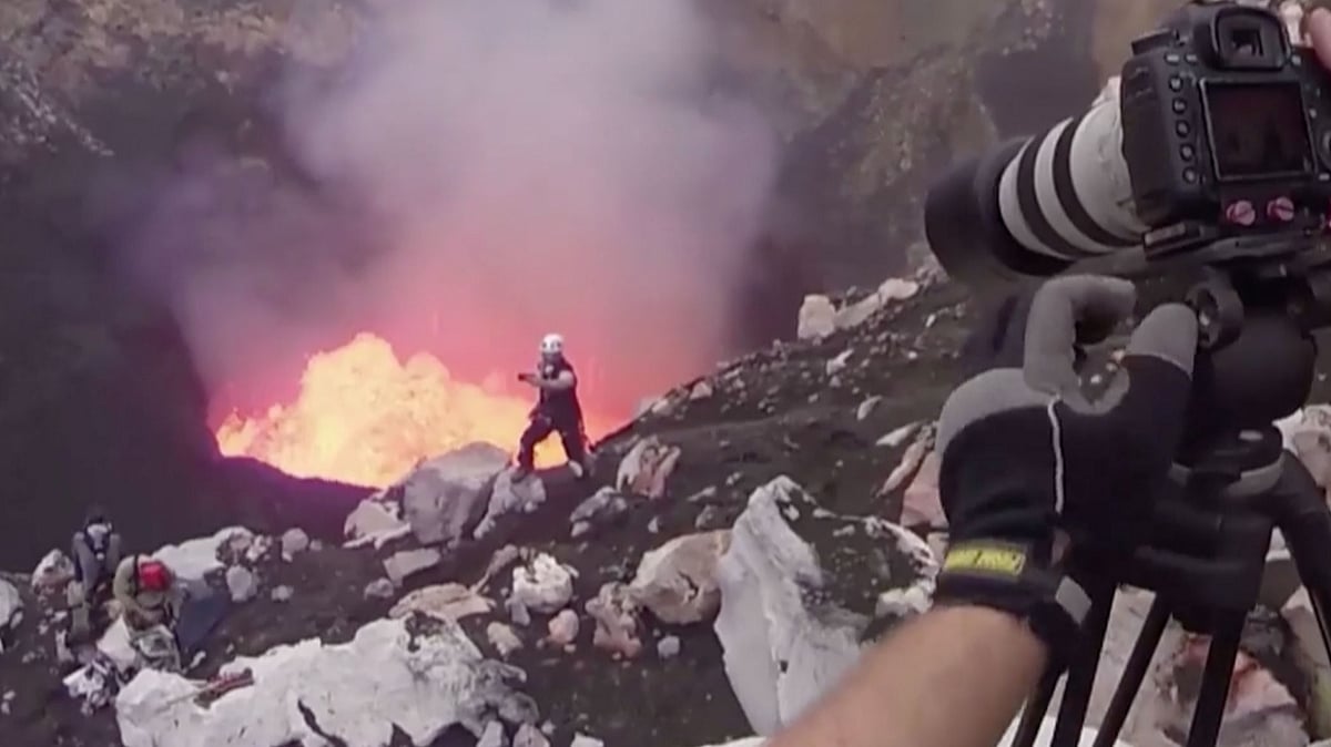 Adventurer Nik Halik inside the Benbow volcanic crater in Vanuatu. (Photo: AP/Caters TV screengrab)