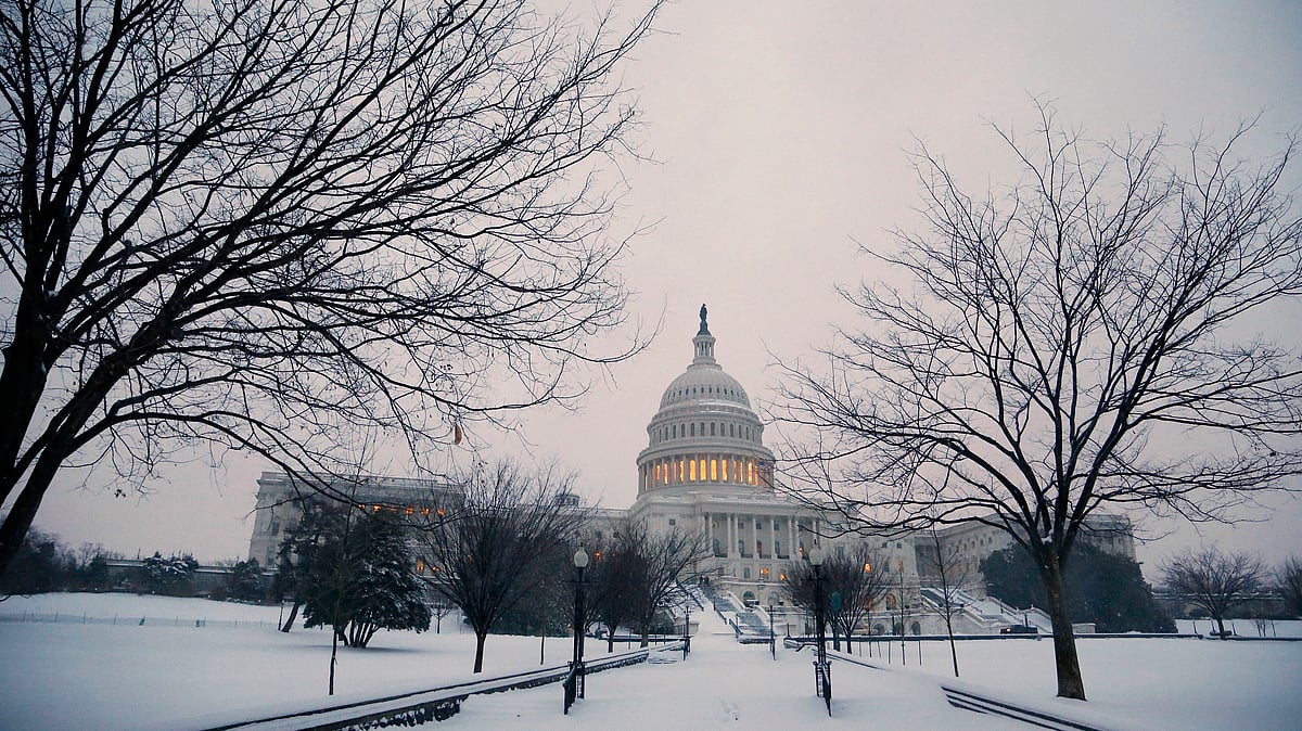 A general view of the US Capitol in early morning snow in Washington. The US Congress has imposed a special fee of up to $4,500 on the H-1B and L-1 visas popular among Indian IT companies. (Photo: Reuters)