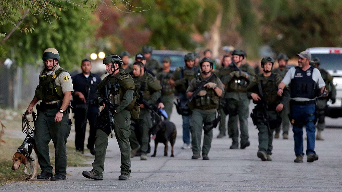 Authorities search for a suspect following a shooting that killed multiple people at a social services facility Wednesday, December 2, 2015, in San Bernardino, California (Photo: AP)