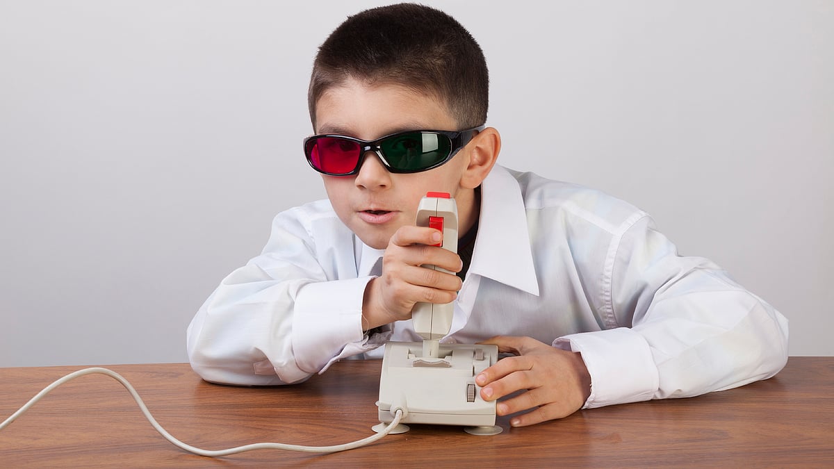Small kid playing 3D video game. (Photo: iStockphoto)