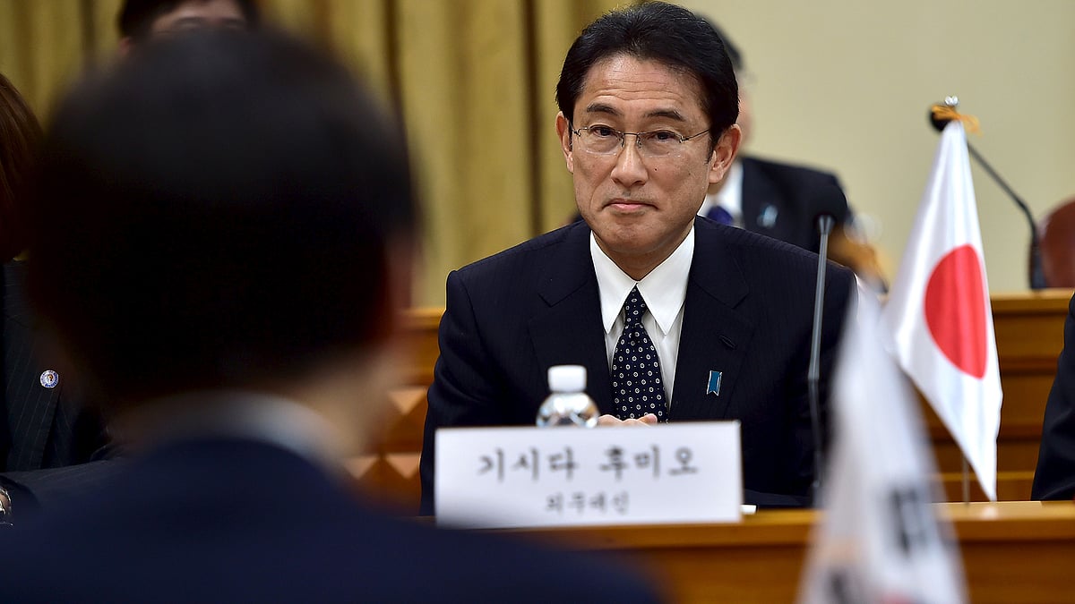 Japan’s Foreign Minister Fumio Kishida (facing camera) sits
facing his South Korean counterpart Yun Byung-Se during their in Seoul. (Photo: Reuters) 
