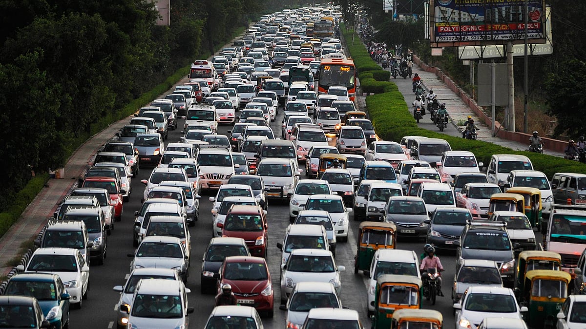 Traffic moves at dusk in New Delhi which has earned the title of the world’s most polluted city. (Photo: AP)