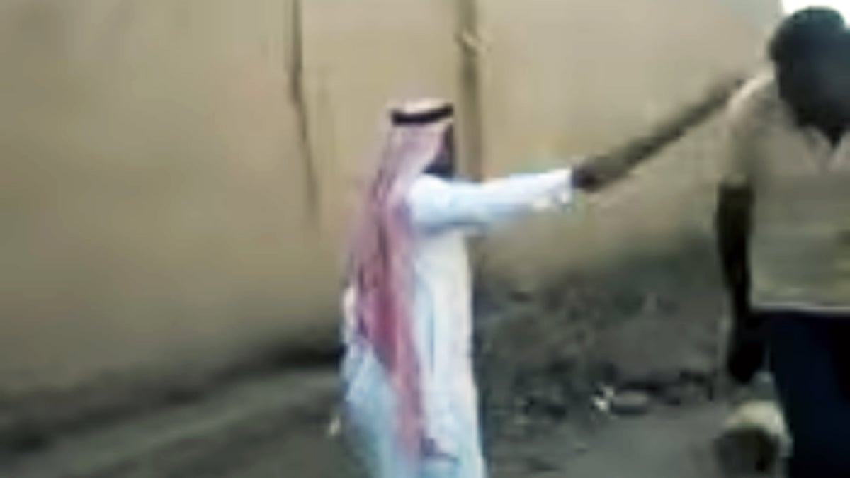 A screenshot of the Saudia employer beating up one of the youths. (Photo coutesy: Whatsapp video)