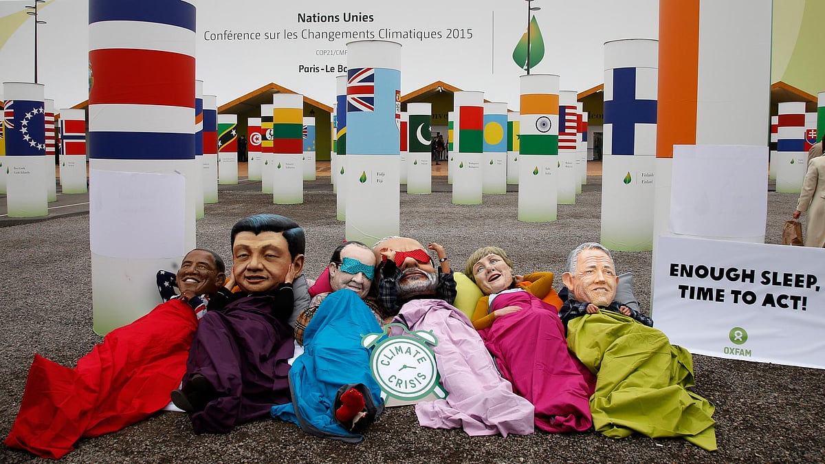 Oxfam activists stage a protest wearing masks of world leaders outside the venue of the World Climate Change Conference 2015 (COP21) in Le Bourget, near Paris, France, December 10, 2015. (Photo: Reuters)