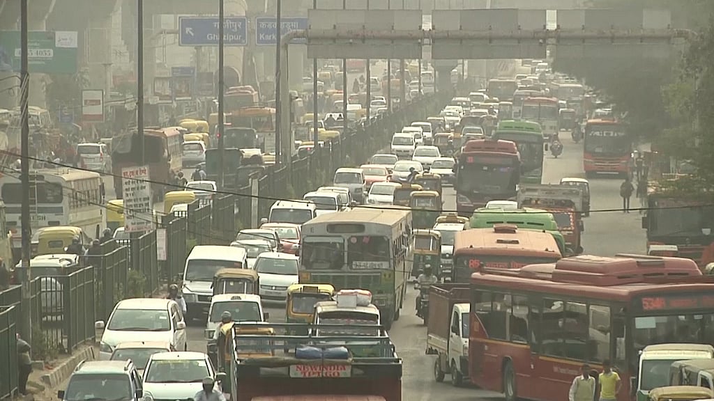 Vehicular smoke and dust particles create a blanket of toxic smog in Delhi. 