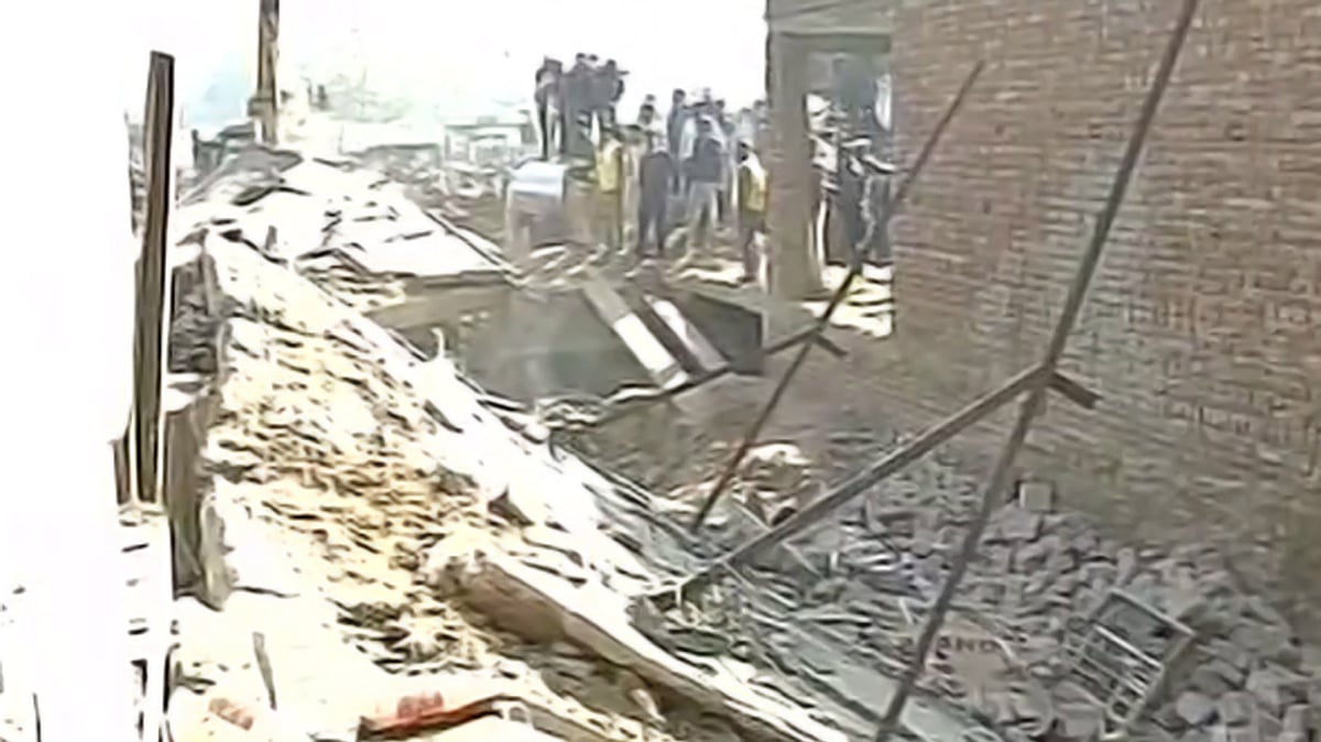 The building that collapsed. (Photo courtesy: ANI screengrab)