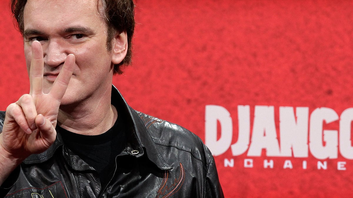 Director Quentin Tarantino flashes a victory sign as he arrives on the red carpet for the German premiere for <i>Django Unchained </i>in Berlin January 8, 2013. (Photo: Reuters)