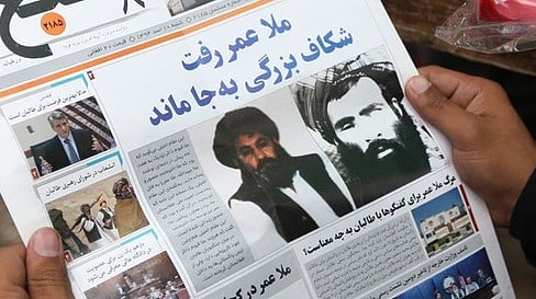 An Afghan newspaper carrying a picture of Mullah Akhtar Mohammad Mansoor. (Photo: AP)