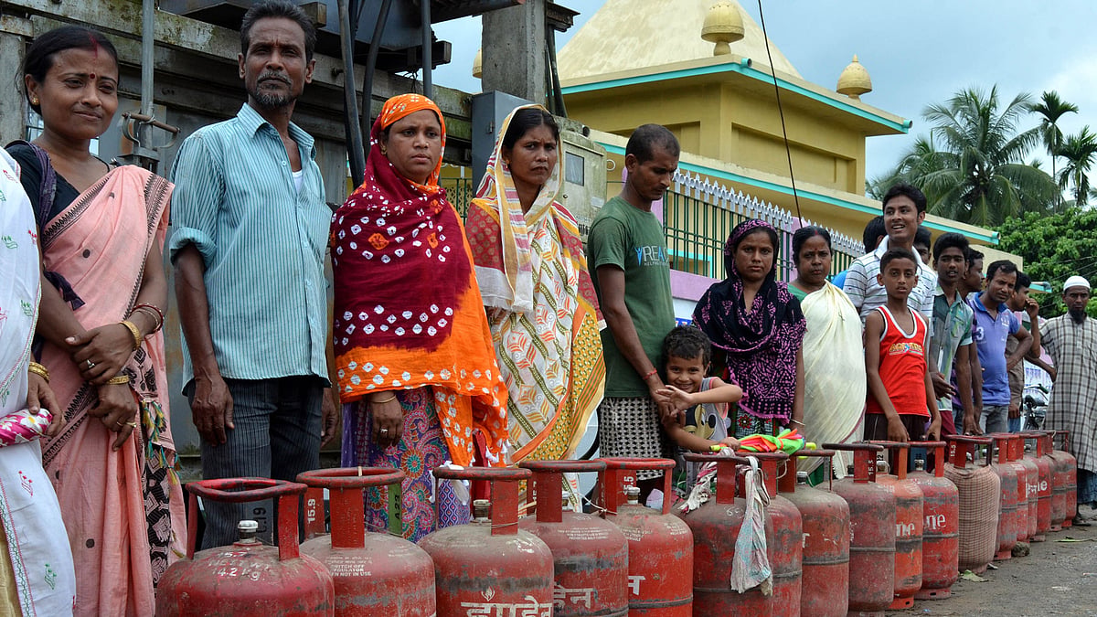 People queue-up to refill their LPG cylinder in Nagaon district of Assam. (Photo: IANS) 