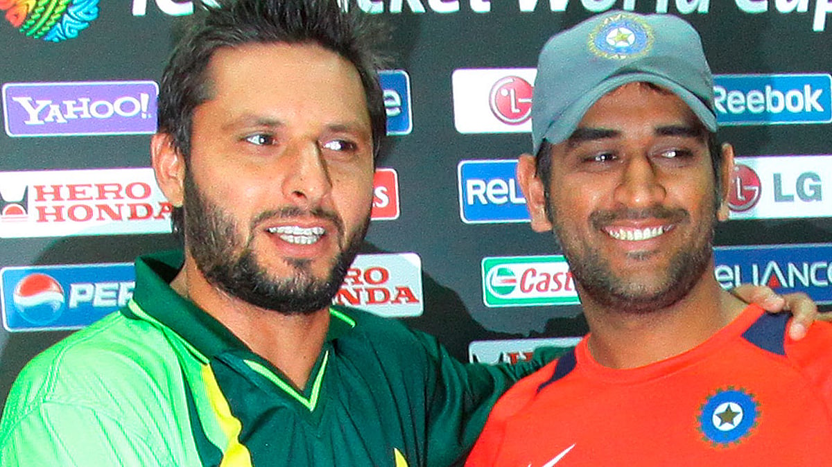 India’s T20 skipper Virat Kohli with his Pakistani counterpart Shahid Afridi at a press meet in 2011. (Photo: Reuters)