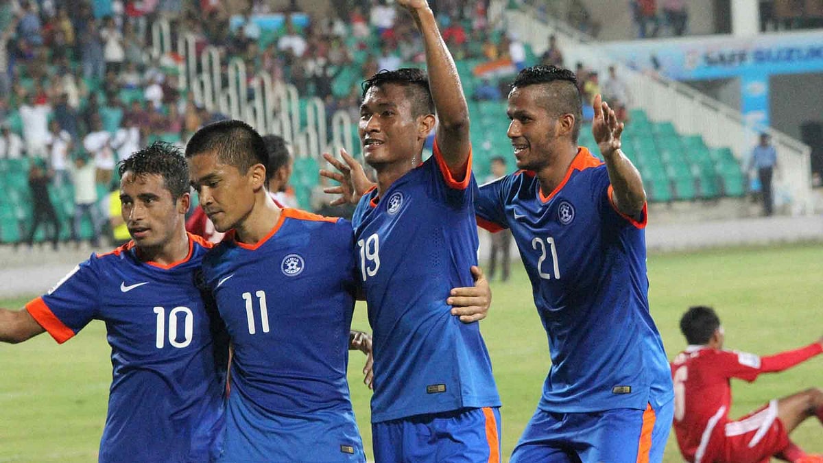 India’s Sunil Chhetri (11) celebrate with teammates after scoring a goal against Nepal during the SAFF Suzuki Cup 2015 match in Thiruvananthapuram on Sunday. (Photo: PTI)