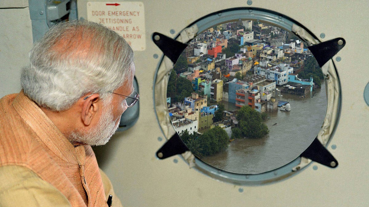 This Photoshopped image of PM Modi on a flood survey was tweeted by PIB on Dec 3, 2015. (Photo: PTI)