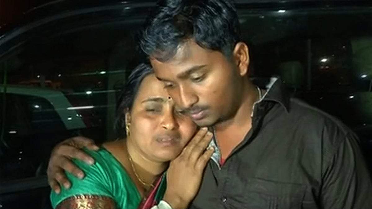 One of the migrant workers from Kerala, at Trivandrum airport after their return from Saudi Arabia. (Photo: ANI screengrab)
