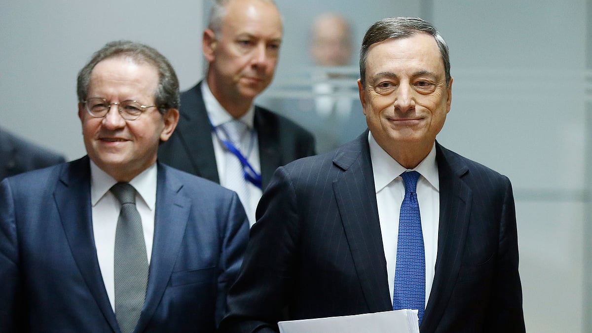 President of European Central Bank Mario Draghi (right) and vice president Vitor Constancio following a meeting of the governing council in Frankfurt, Germany. (Photo: AP)