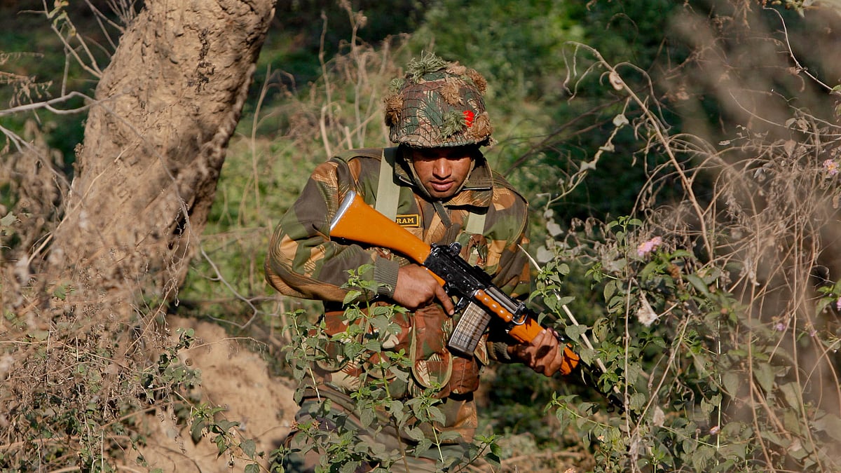 A soldier is seen during a search operation in a forest area outside the Pathankot air force base. (Photo: AP)