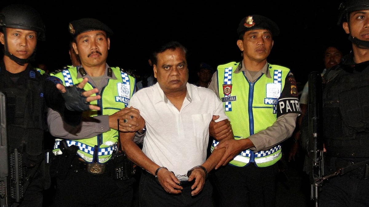Underworld don, Chhota Rajan, being escorted by police after his capture in Bali. (Photo: PTI)