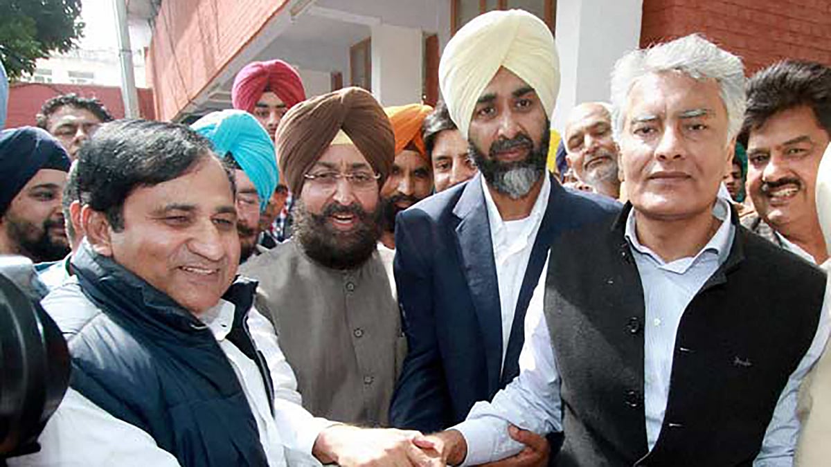 File photo of Punjab Pradesh Congress chief Pratap Singh Bajwa (2nd from left) and Manpreet Badal (2nd from right). (Photo: PTI)