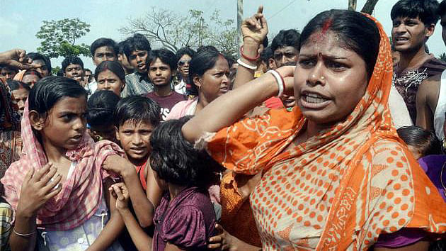 Protestors in Kamduni after the brutal gangrape. (Photo: PTI)