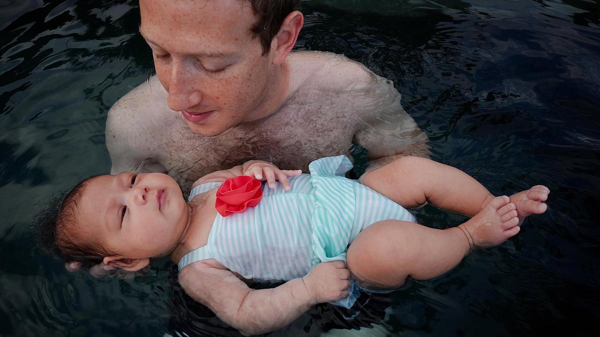 Facebook founder Mark Zuckerberg with two-month-old Max. (Photo Courtesy: <a href="https://www.facebook.com/photo.php?fbid=10102614874143051&set=a.529237706231.2034669.4&type=3&theater">Facebook Page of Mark Zuckerberg</a>)