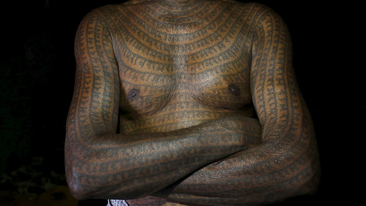 Mahettar Ram Tandon is still proud of the indelible message
he carries, almost five decades after he had the name of the Hindu god Ram
tattooed over his entire body. (Photo: Reuters)
