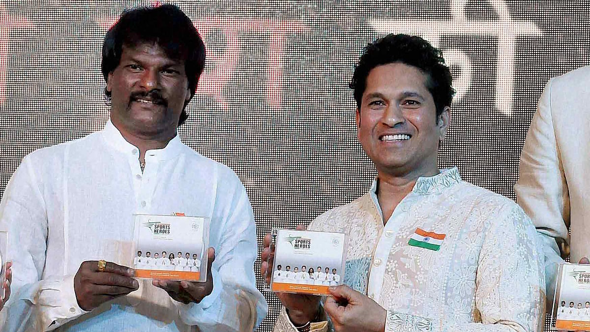 Former hockey player Dhanraj Pillay, Cricket legend Sachin Tendulkar at the launch of their rendition of the National Anthem in Mumbai on Sunday. (Photo: PTI)