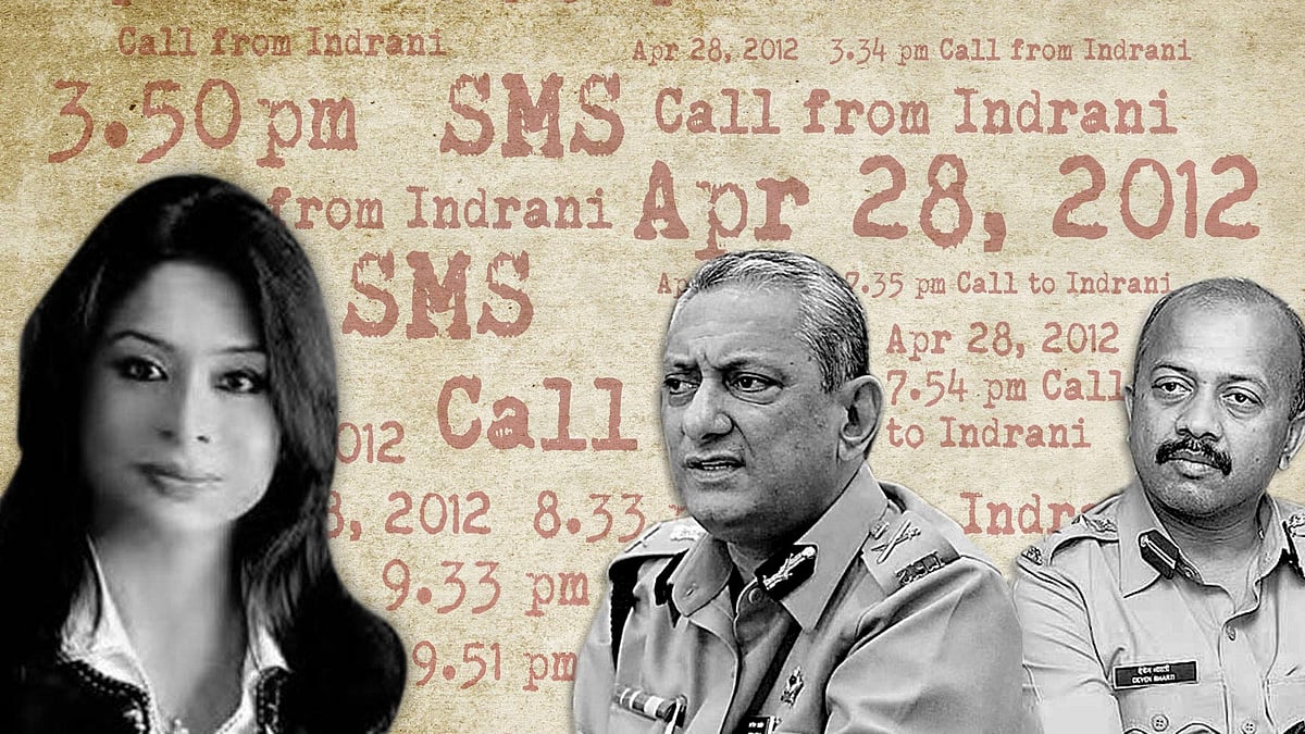 Rakesh Maria (centre) and Deven Bharti.
