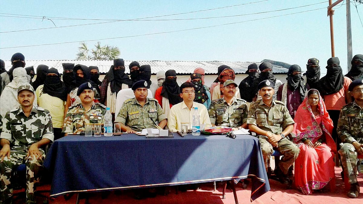 Naxals surrendered to Inspector General of Police SRP Kaluri in Sukma, on Tuesday. (Photo: PTI)