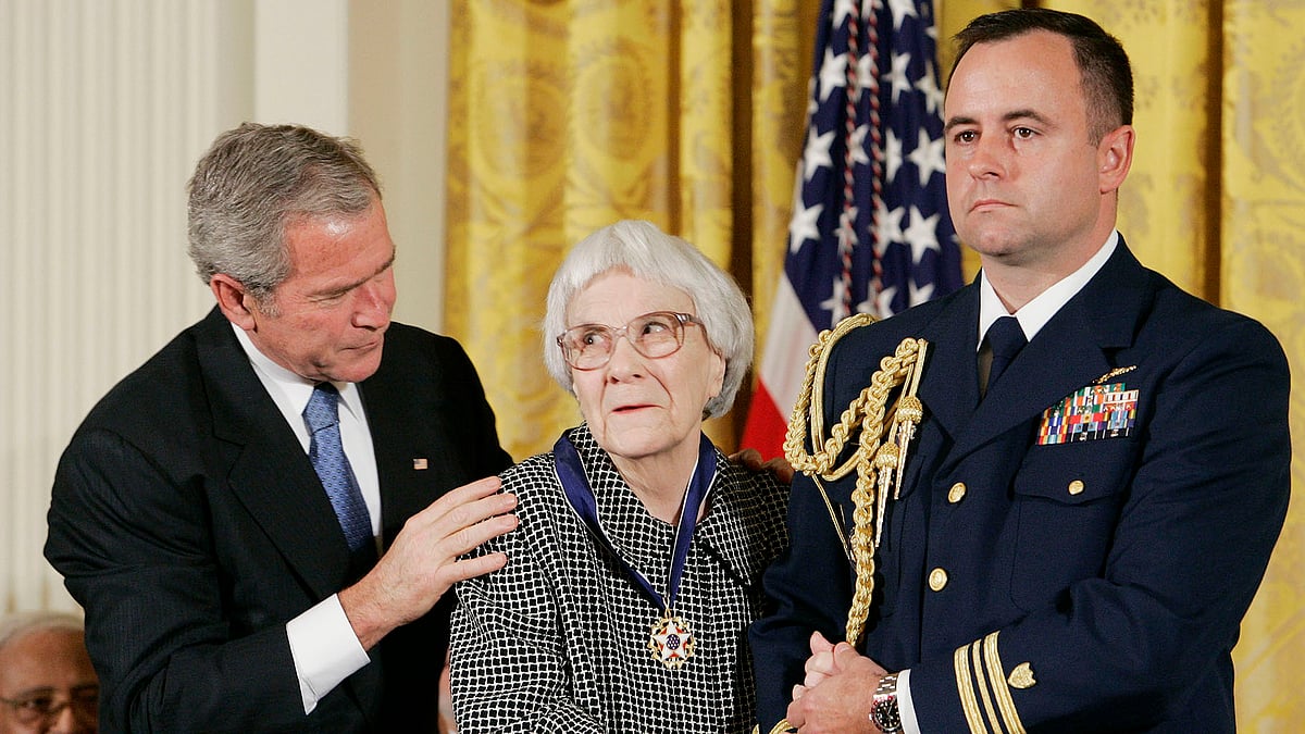 In this 2007 photo, the then US President George W. Bush
awards the Presidential Medal of Freedom to American novelist Harper Lee in the
White House. (Photo: Reuters)