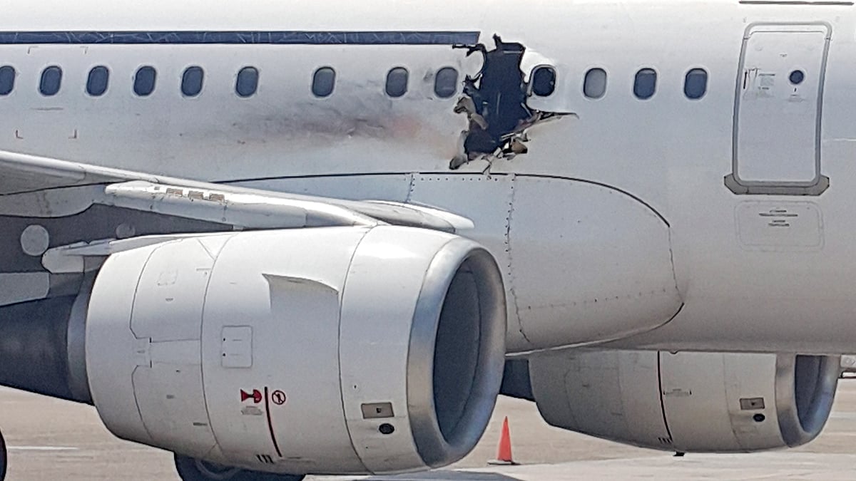 Daallo Airline aircraft with blown up fuselage from the mid-air explosion. (Photo: AP)