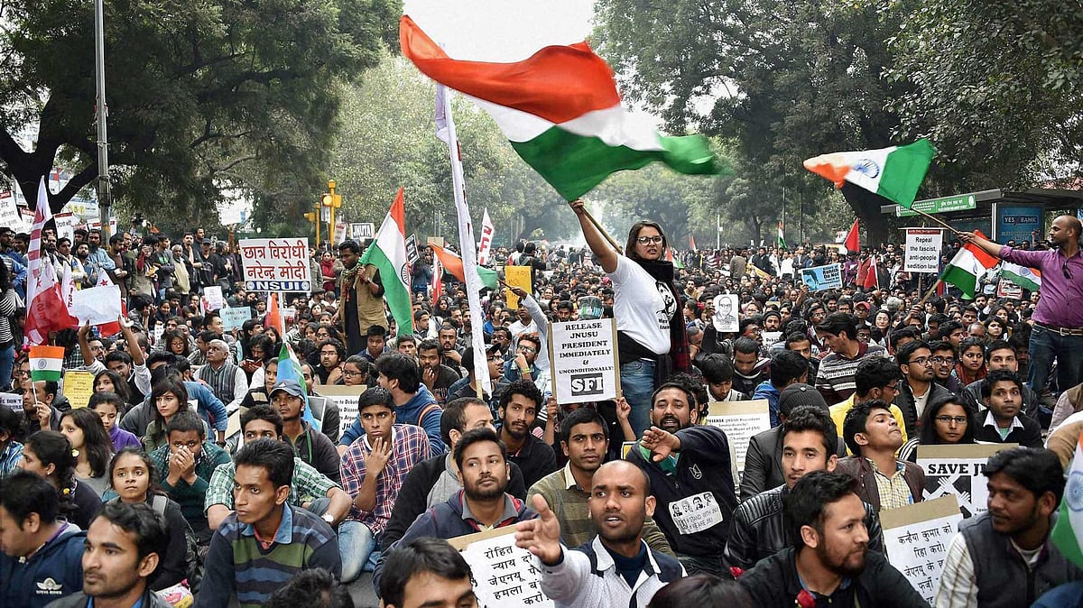 Students march from Mandi House to Jantar Mantar demanding the release of JNUSU President Kanhaiya Kumar. (Photo: PTI)