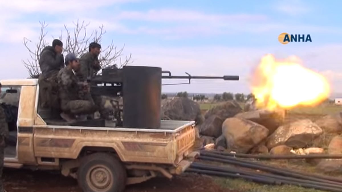 Syrian Kurdish forces attacking the rebel-held former military airport in Menagh. (Photo Courtesy: <a href="https://www.youtube.com/watch?v=l06ur7OQTMw">Youtube Screengrab</a>)