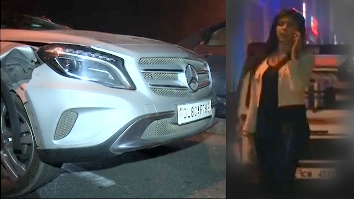 Couple driving a Mercedes first hit two men riding a motorcycle and then misbehaved and manhandled them. (Photo: ANI screengrab) 