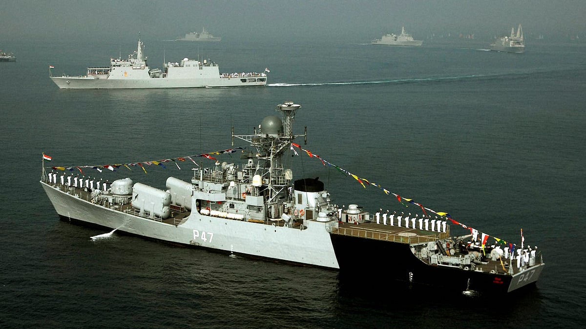 An Indian naval ship takes part in the final rehearsal of the International Fleet Review in Visakhapatnam. (Photo: PTI)