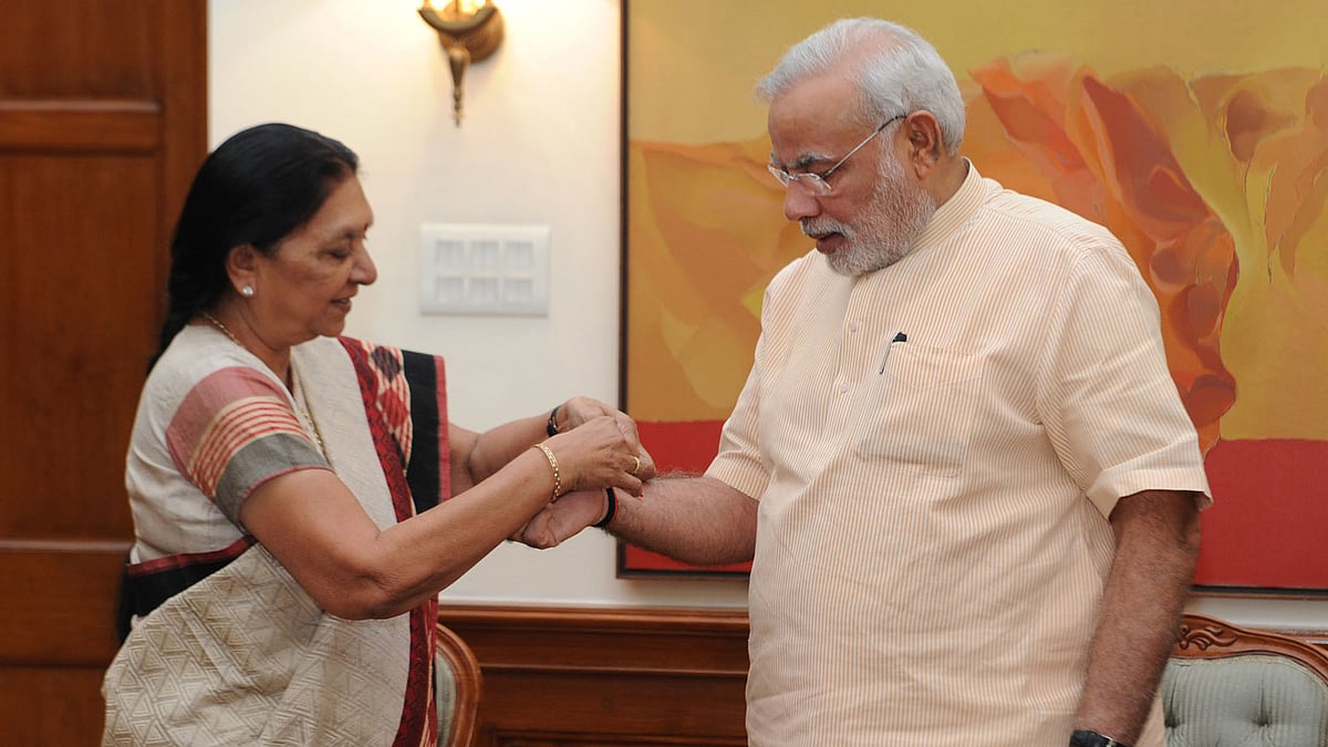 Gujarat Chief Minister Anandiben Patel with Prime Minister Narendra Modi. (Photo Courtesy: PIB)