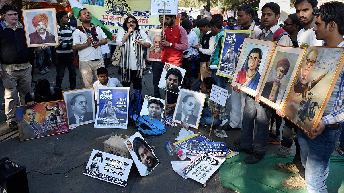 Students raise slogans during a rally demanding justice for Dalit scholar Rohith Vemula‘s at Jantar Mantar in New Delhi on Tuesday. (Photo: PTI)