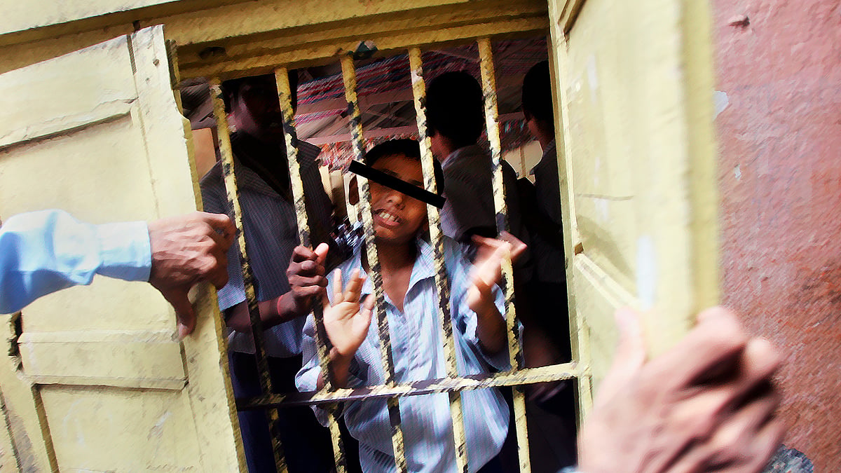 A minor looking out of the window of an observation home. (Photo: Reuters)