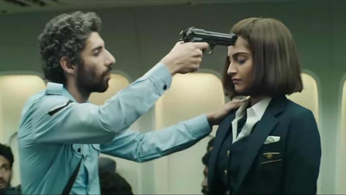 A screen grab from <i>Neerja </i>actor Jim Sarbh pointing gun at Sonam Kapoor. (Photo Courtesy: <a href="https://www.youtube.com/watch?v=7779JrWy04g">YouTube/FoxStarHindi</a>)